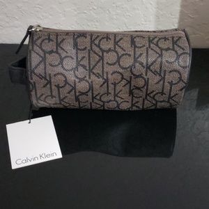 Calvin Klein cylinder toiletries pouch